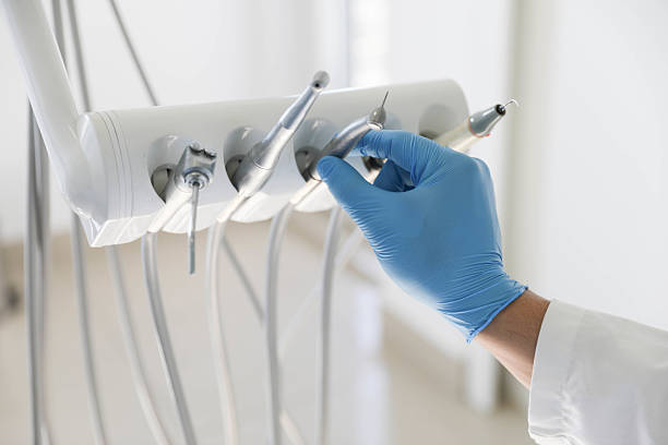 Professional Tooth Extraction technician working in Houghton, MI
